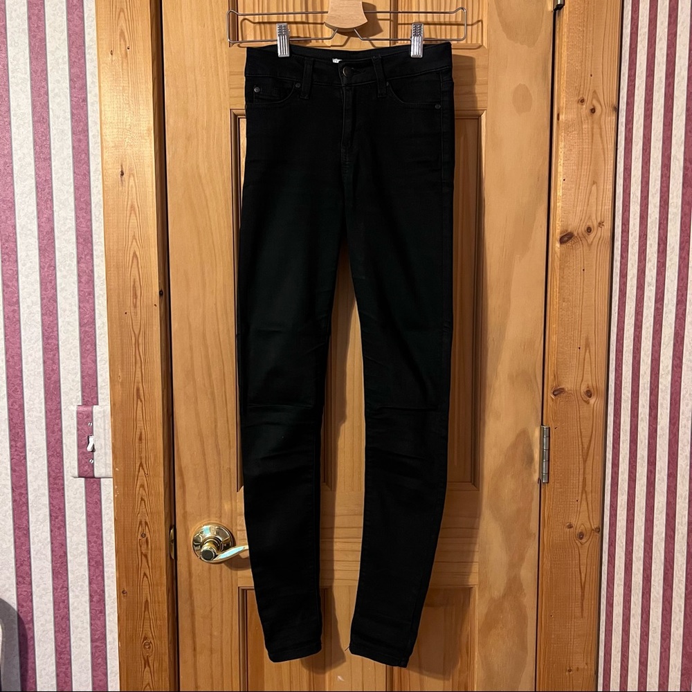 black mid rise skinny jeans
